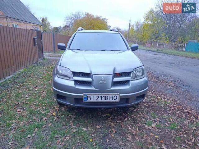 Мицубиси Аутлендер 2003 в Миргороде на Automoto.ua Серый Мицубиси Аутлендер, объемом двигателя 2 л и пробегом 354 тыс. км за 5000 $, фото 1 на Automoto.ua
