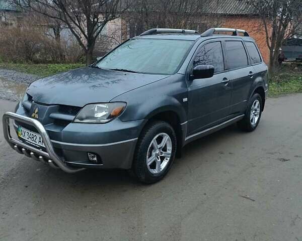 Сірий Міцубісі Аутлендер, об'ємом двигуна 2 л та пробігом 160 тис. км за 4800 $, фото 7 на Automoto.ua