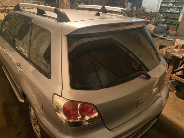 Сірий Міцубісі Аутлендер, об'ємом двигуна 2.4 л та пробігом 275 тис. км за 6400 $, фото 9 на Automoto.ua