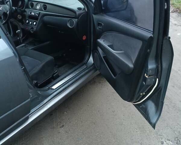 Сірий Міцубісі Аутлендер, об'ємом двигуна 2 л та пробігом 160 тис. км за 4800 $, фото 14 на Automoto.ua