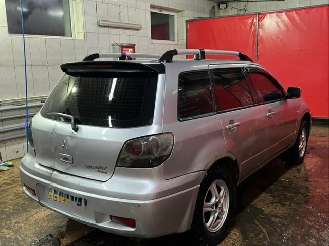 Серый Мицубиси Аутлендер, объемом двигателя 0 л и пробегом 300 тыс. км за 2500 $, фото 2 на Automoto.ua