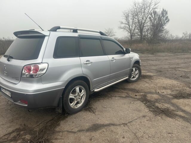 Сірий Міцубісі Аутлендер, об'ємом двигуна 2.4 л та пробігом 275 тис. км за 6400 $, фото 3 на Automoto.ua