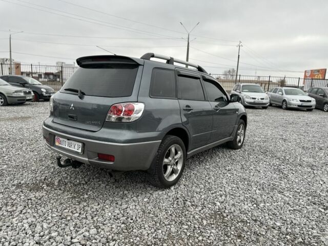 Серый Мицубиси Аутлендер, объемом двигателя 0 л и пробегом 265 тыс. км за 6300 $, фото 3 на Automoto.ua