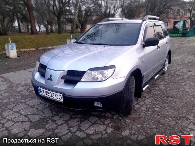 Серый Мицубиси Аутлендер, объемом двигателя 2 л и пробегом 0 тыс. км за 5000 $, фото 1 на Automoto.ua