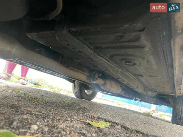 Сірий Міцубісі Аутлендер, об'ємом двигуна 2 л та пробігом 252 тис. км за 4600 $, фото 31 на Automoto.ua