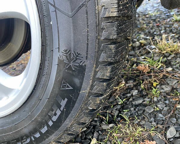 Серый Мицубиси Аутлендер, объемом двигателя 2 л и пробегом 250 тыс. км за 5700 $, фото 13 на Automoto.ua