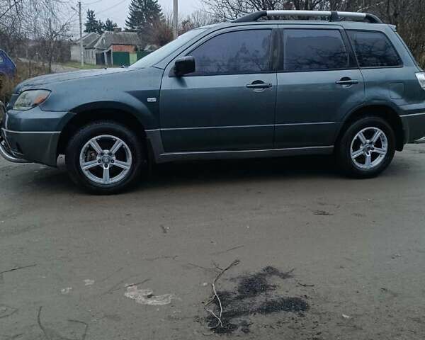 Сірий Міцубісі Аутлендер, об'ємом двигуна 2 л та пробігом 160 тис. км за 4800 $, фото 6 на Automoto.ua