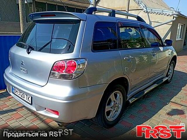 Серый Мицубиси Аутлендер, объемом двигателя 2 л и пробегом 280 тыс. км за 5500 $, фото 6 на Automoto.ua