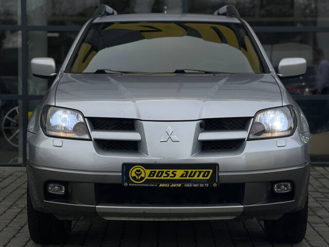 Сірий Міцубісі Аутлендер, об'ємом двигуна 2.4 л та пробігом 240 тис. км за 6700 $, фото 1 на Automoto.ua