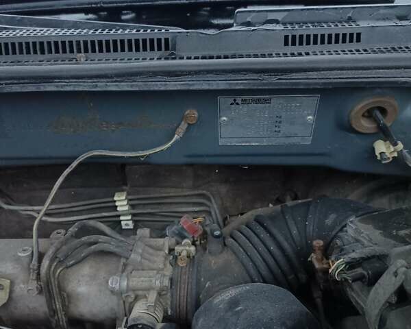 Сірий Міцубісі Аутлендер, об'ємом двигуна 2 л та пробігом 160 тис. км за 4800 $, фото 16 на Automoto.ua