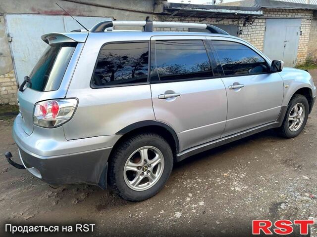 Сірий Міцубісі Аутлендер, об'ємом двигуна 2 л та пробігом 333 тис. км за 4850 $, фото 6 на Automoto.ua