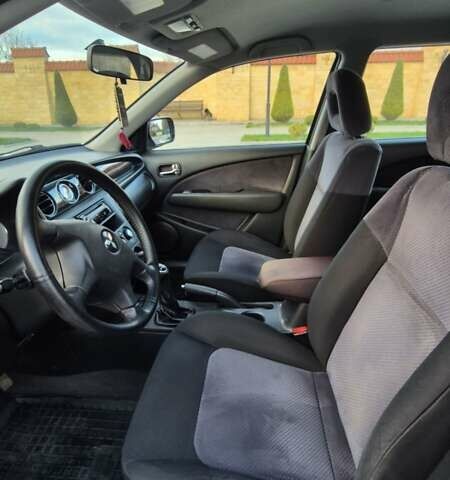 Серый Мицубиси Аутлендер, объемом двигателя 2 л и пробегом 209 тыс. км за 5800 $, фото 8 на Automoto.ua