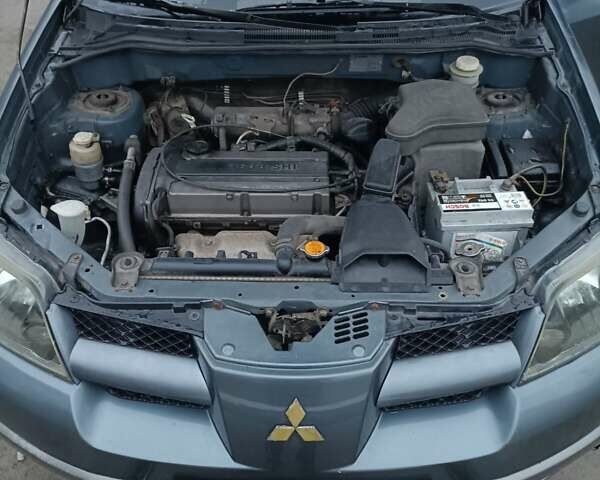 Сірий Міцубісі Аутлендер, об'ємом двигуна 2 л та пробігом 160 тис. км за 4800 $, фото 15 на Automoto.ua