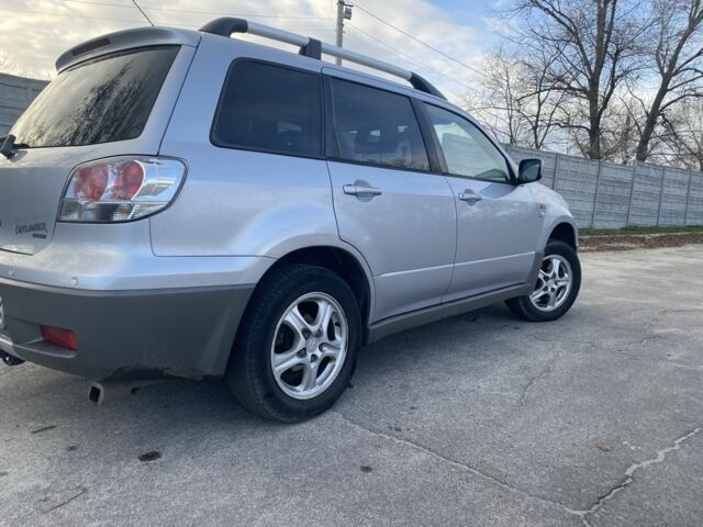 Сірий Міцубісі Аутлендер, об'ємом двигуна 2 л та пробігом 228 тис. км за 6300 $, фото 3 на Automoto.ua