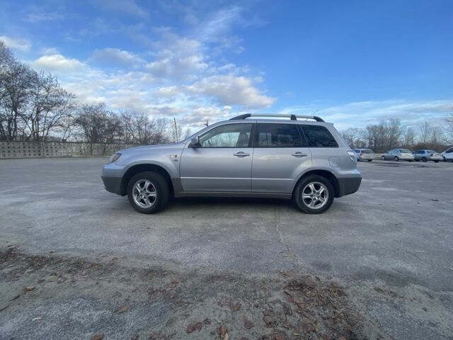 Сірий Міцубісі Аутлендер, об'ємом двигуна 2 л та пробігом 228 тис. км за 6300 $, фото 1 на Automoto.ua