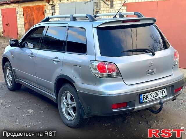 Сірий Міцубісі Аутлендер, об'ємом двигуна 2 л та пробігом 333 тис. км за 4850 $, фото 4 на Automoto.ua