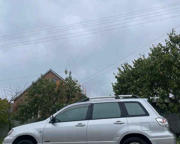 Сірий Міцубісі Аутлендер, об'ємом двигуна 2 л та пробігом 252 тис. км за 4600 $, фото 14 на Automoto.ua