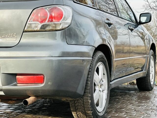 Сірий Міцубісі Аутлендер, об'ємом двигуна 2 л та пробігом 280 тис. км за 3500 $, фото 5 на Automoto.ua