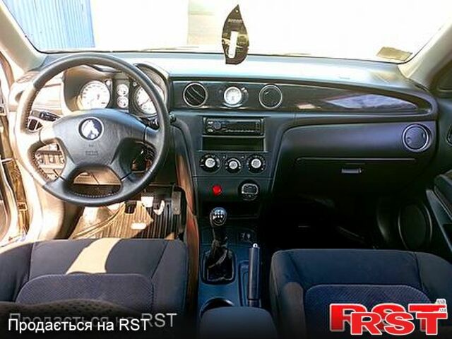 Серый Мицубиси Аутлендер, объемом двигателя 2 л и пробегом 280 тыс. км за 5500 $, фото 3 на Automoto.ua