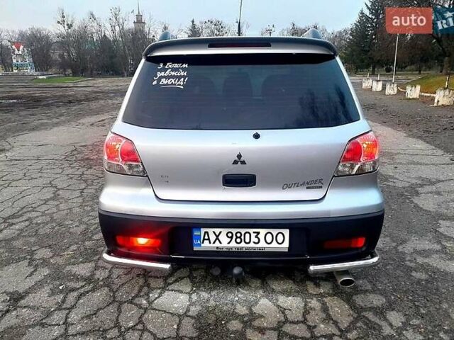 Серый Мицубиси Аутлендер, объемом двигателя 2 л и пробегом 400 тыс. км за 5000 $, фото 6 на Automoto.ua