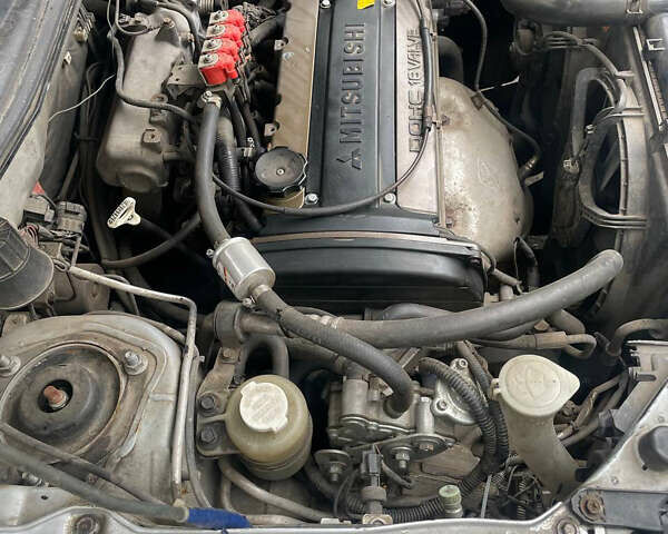 Сірий Міцубісі Аутлендер, об'ємом двигуна 2 л та пробігом 252 тис. км за 4600 $, фото 28 на Automoto.ua