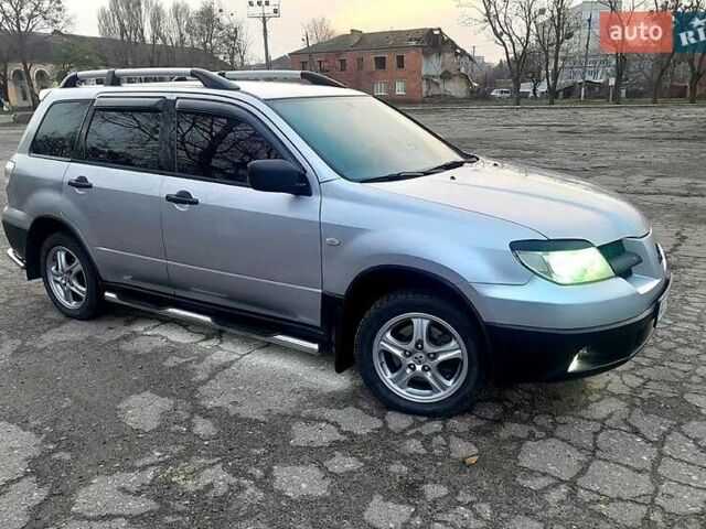 Серый Мицубиси Аутлендер, объемом двигателя 2 л и пробегом 400 тыс. км за 5000 $, фото 10 на Automoto.ua