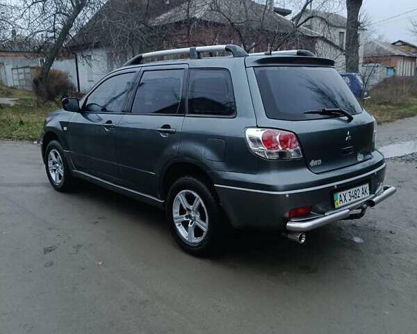 Сірий Міцубісі Аутлендер, об'ємом двигуна 2 л та пробігом 160 тис. км за 4800 $, фото 5 на Automoto.ua