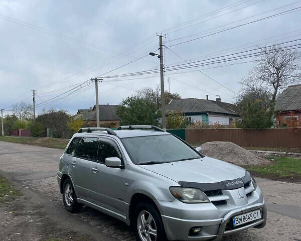 Сірий Міцубісі Аутлендер, об'ємом двигуна 2 л та пробігом 252 тис. км за 4600 $, фото 5 на Automoto.ua