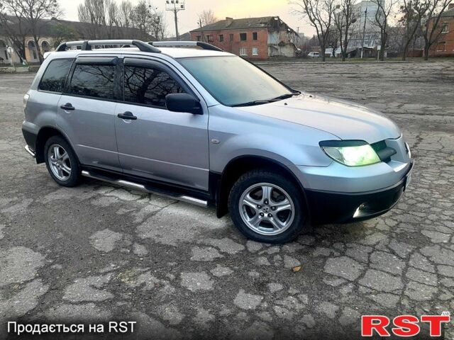 Серый Мицубиси Аутлендер, объемом двигателя 2 л и пробегом 0 тыс. км за 5000 $, фото 11 на Automoto.ua