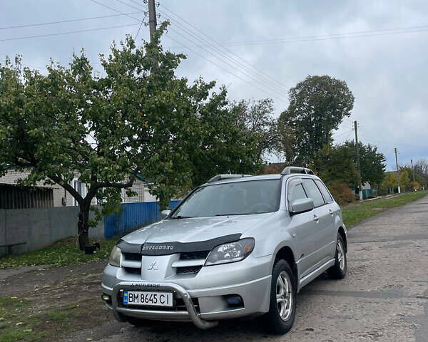 Сірий Міцубісі Аутлендер, об'ємом двигуна 2 л та пробігом 252 тис. км за 4600 $, фото 4 на Automoto.ua