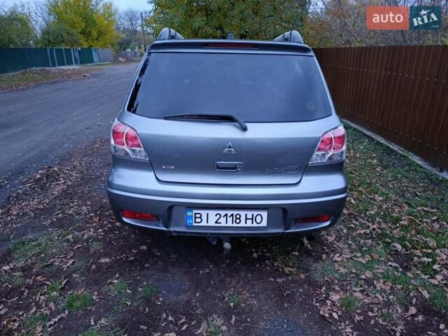 Мицубиси Аутлендер 2003 в Миргороде на Automoto.ua Серый Мицубиси Аутлендер, объемом двигателя 2 л и пробегом 354 тыс. км за 5000 $, фото 3 на Automoto.ua