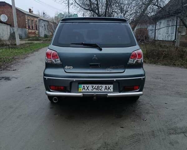 Сірий Міцубісі Аутлендер, об'ємом двигуна 2 л та пробігом 160 тис. км за 4800 $, фото 4 на Automoto.ua