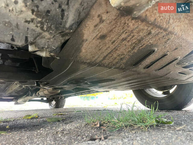 Сірий Міцубісі Аутлендер, об'ємом двигуна 2 л та пробігом 252 тис. км за 4600 $, фото 35 на Automoto.ua