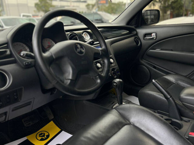 Сірий Міцубісі Аутлендер, об'ємом двигуна 2.4 л та пробігом 240 тис. км за 6700 $, фото 9 на Automoto.ua