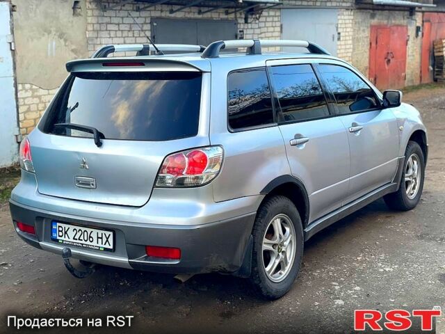 Сірий Міцубісі Аутлендер, об'ємом двигуна 2 л та пробігом 333 тис. км за 4850 $, фото 3 на Automoto.ua
