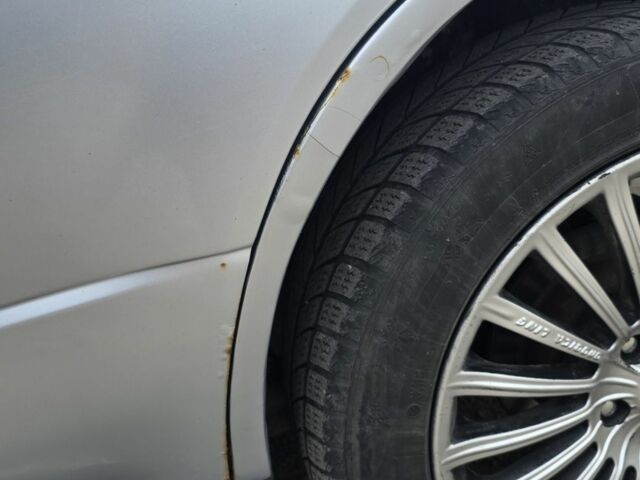 Серый Мицубиси Аутлендер, объемом двигателя 2 л и пробегом 300 тыс. км за 7000 $, фото 5 на Automoto.ua