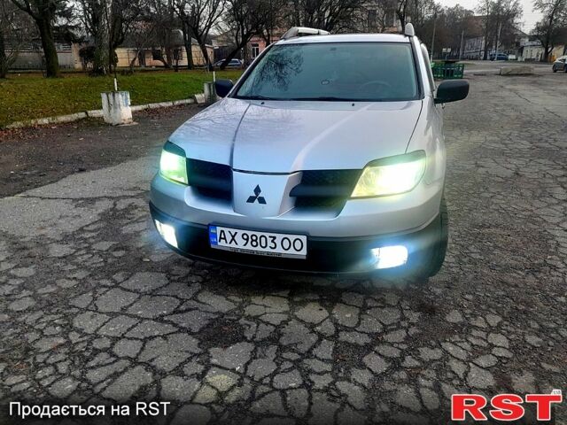 Серый Мицубиси Аутлендер, объемом двигателя 2 л и пробегом 0 тыс. км за 5000 $, фото 10 на Automoto.ua