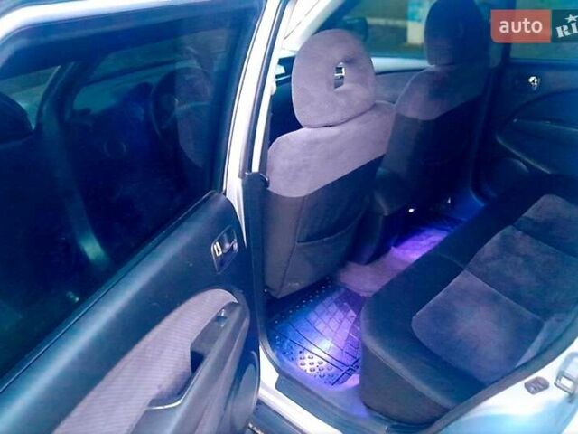 Серый Мицубиси Аутлендер, объемом двигателя 2 л и пробегом 400 тыс. км за 5000 $, фото 4 на Automoto.ua