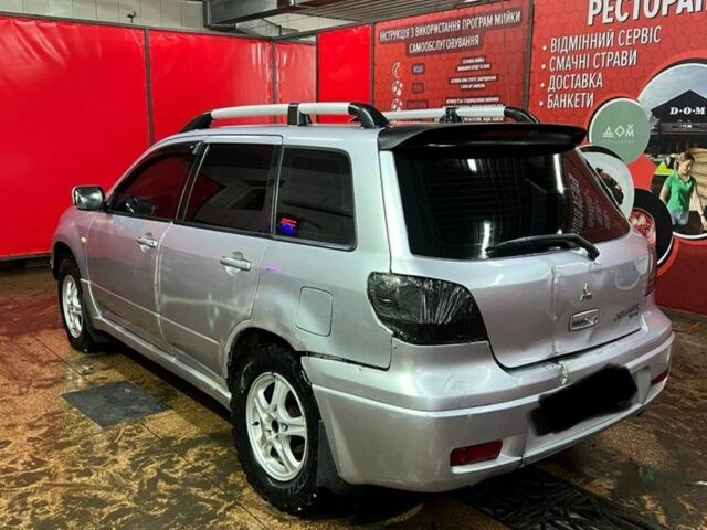 Серый Мицубиси Аутлендер, объемом двигателя 0 л и пробегом 400 тыс. км за 2500 $, фото 1 на Automoto.ua