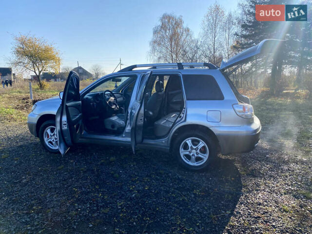 Серый Мицубиси Аутлендер, объемом двигателя 2 л и пробегом 250 тыс. км за 5700 $, фото 15 на Automoto.ua