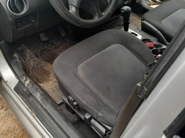 Серый Мицубиси Аутлендер, объемом двигателя 2.4 л и пробегом 250 тыс. км за 5600 $, фото 7 на Automoto.ua