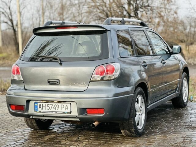 Сірий Міцубісі Аутлендер, об'ємом двигуна 2 л та пробігом 280 тис. км за 3500 $, фото 4 на Automoto.ua