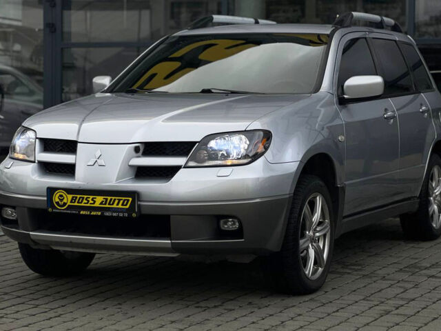 Сірий Міцубісі Аутлендер, об'ємом двигуна 2.4 л та пробігом 240 тис. км за 6700 $, фото 2 на Automoto.ua
