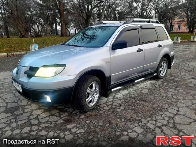 Серый Мицубиси Аутлендер, объемом двигателя 2 л и пробегом 0 тыс. км за 5000 $, фото 9 на Automoto.ua