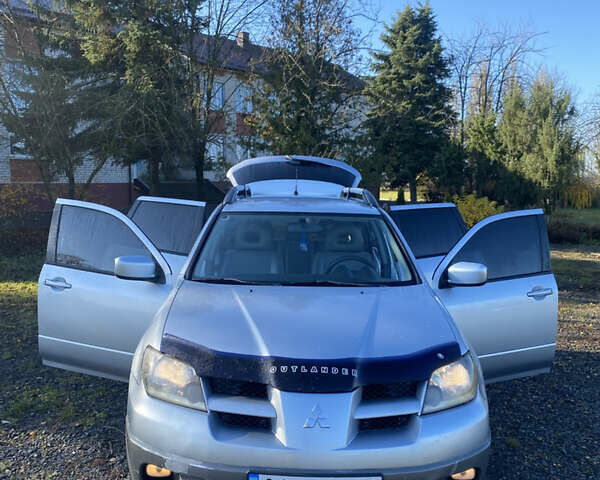 Серый Мицубиси Аутлендер, объемом двигателя 2 л и пробегом 250 тыс. км за 5700 $, фото 14 на Automoto.ua