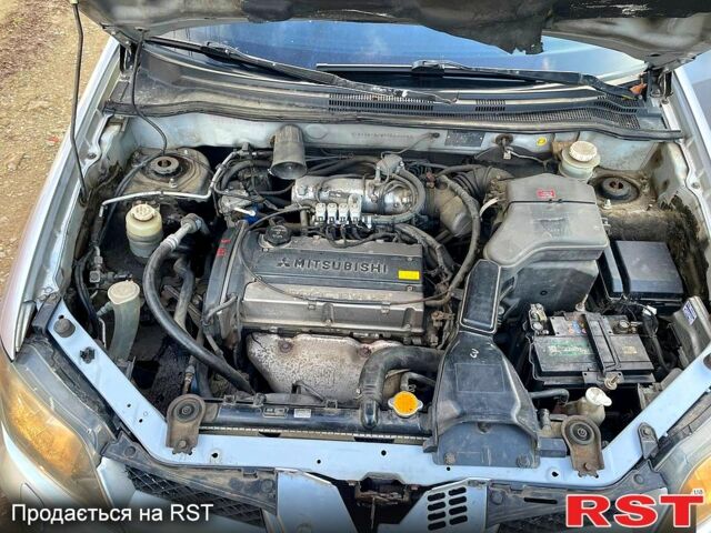 Сірий Міцубісі Аутлендер, об'ємом двигуна 2 л та пробігом 333 тис. км за 4850 $, фото 11 на Automoto.ua