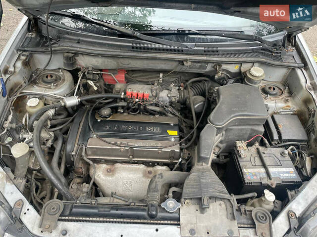 Сірий Міцубісі Аутлендер, об'ємом двигуна 2 л та пробігом 252 тис. км за 4600 $, фото 27 на Automoto.ua
