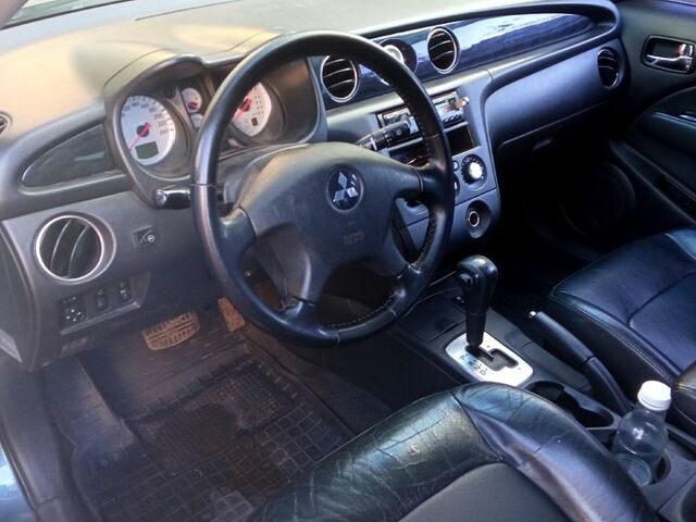 Серый Мицубиси Аутлендер, объемом двигателя 2.4 л и пробегом 204 тыс. км за 5600 $, фото 5 на Automoto.ua