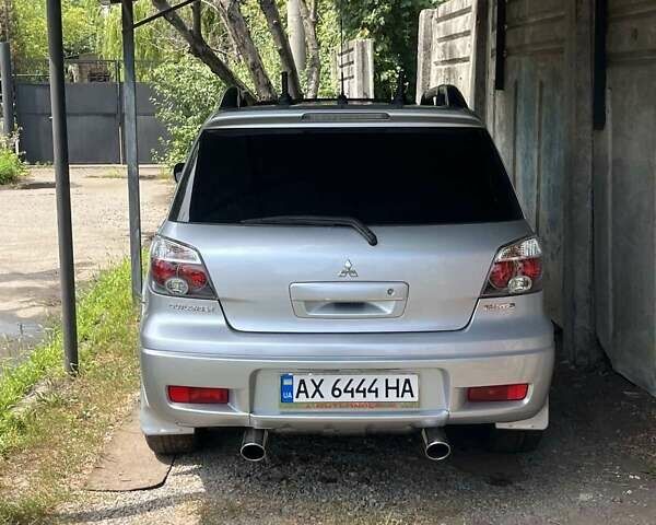 Сірий Міцубісі Аутлендер, об'ємом двигуна 2 л та пробігом 227 тис. км за 8500 $, фото 3 на Automoto.ua