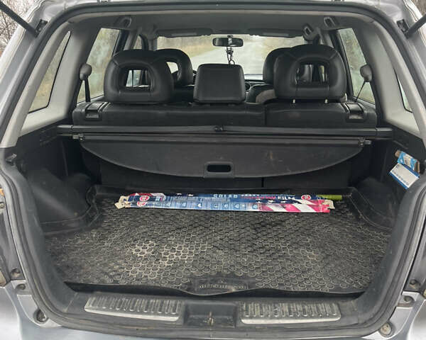 Серый Мицубиси Аутлендер, объемом двигателя 2.38 л и пробегом 432 тыс. км за 4700 $, фото 7 на Automoto.ua